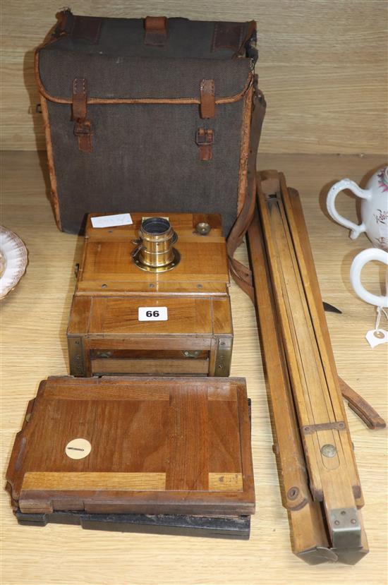 A 19th century Eugen Loeber plate camera and tripod stand